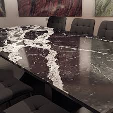 STONE DINING TABLES